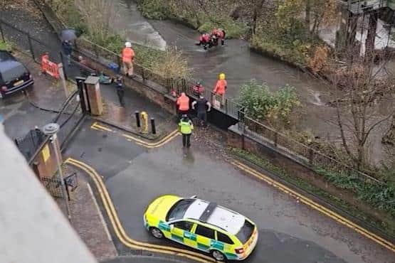 Emergency services rescue a man in his 40s from the River Douglas near Woodcock House, Scholes Village