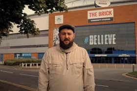The opening shot of the People Make Wigan video