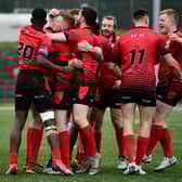 London Skolars celebrate after Omani Caro scores a try against Workington Town in 2019
