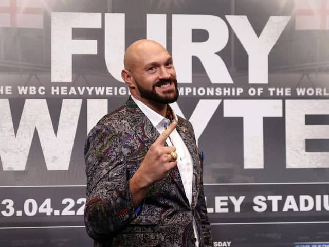 Tyson Fury gestures during the Tyson Fury v Dillian Whyte press conference at Wembley Stadium on March 01, 2022 in Londo