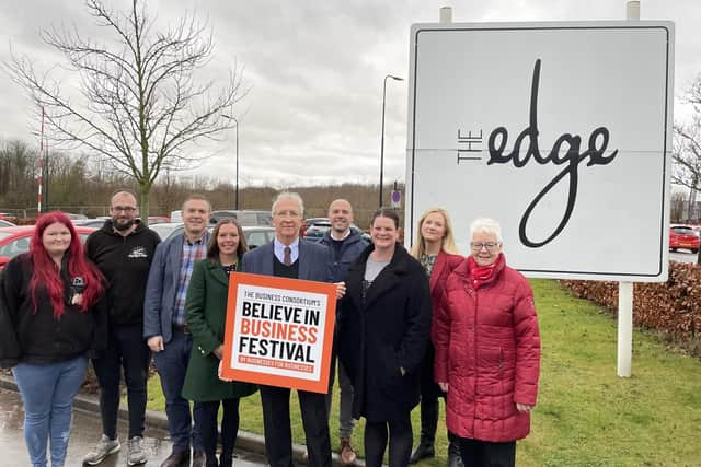 Coun David Molyneux with representatives from Wigan Council, traders and the Business Consortium.