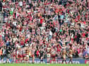 The Huddersfield players can't believe it after Liam Marshall's late winning try