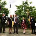 The Mayor of Wigan Coun Marie Morgan and her consort Coun Clive Morgan at the service with armed forces veterans