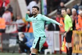 Jordan Jones celebrates scoring for Latics in their 2-0 victory at Exeter last October