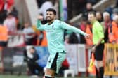Jordan Jones celebrates scoring for Latics in their 2-0 victory at Exeter last October