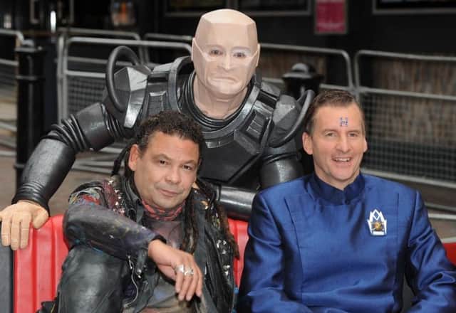 Rimmer (Chris Barrie) and two of his Red Dwarf co-stars Lister (Craig Charles) and Kryten (Robert Llewellyn)