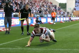Sam Halsall went over for Wigan's first try in the win against Warrington Wolves