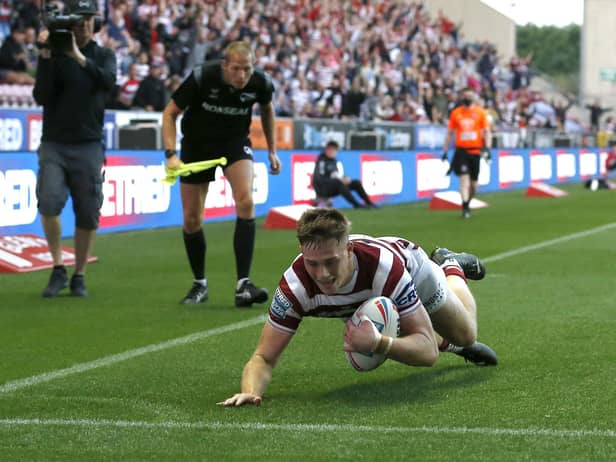 Sam Halsall went over for Wigan's first try in the win against Warrington Wolves