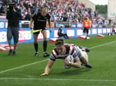 Sam Halsall went over for Wigan's first try in the win against Warrington Wolves