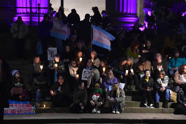 Members of the public attend a candle-lit vigil outside St George's Hall, Liverpool, in memory of transgender teenager Brianna Ghey, who was fatally stabbed in a park on Saturday. The 16-year-old from Birchwood in Warrington, Cheshire, was found as she lay wounded on a path in Linear Park, Culcheth.