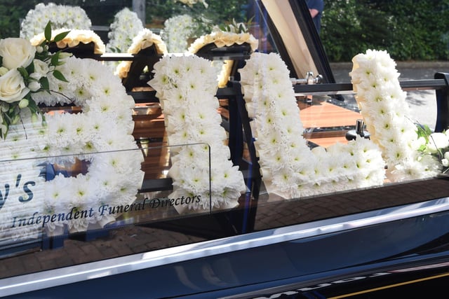 The funeral service took place in the South Stand of the DW Stadium.