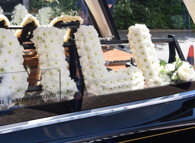 The funeral service took place in the South Stand of the DW Stadium.