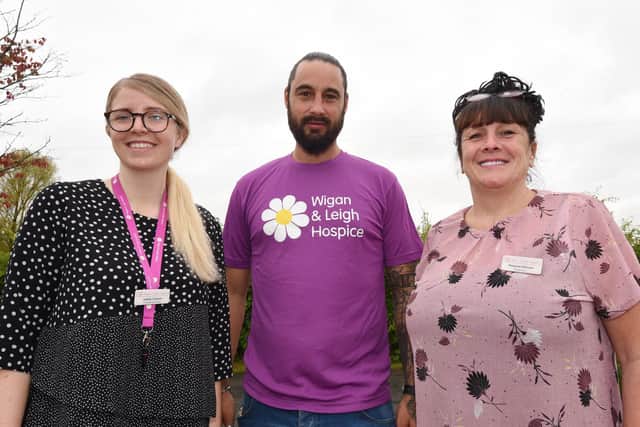 Jeff Long is preparing for a charity skydive, to raise funds for Wigan and Leigh Hospice.  He is pictured with Sophie Cannon, left, and Margaret Atkinson, right, from the hospice