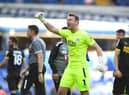 Jamie Jones celebrates Wigan's victory over Birmingham (Photo by Tony Marshall/Getty Images)