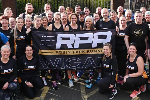 Robin Park Runners, during a Tuesday night session in Wigan, as they get ready for the Park Run takeover at Haigh Woodland Park.  The Wigan-based running club launches its first-ever takeover of the weekly 5km event on Saturday 27 April, all in the aim of attracting new members.