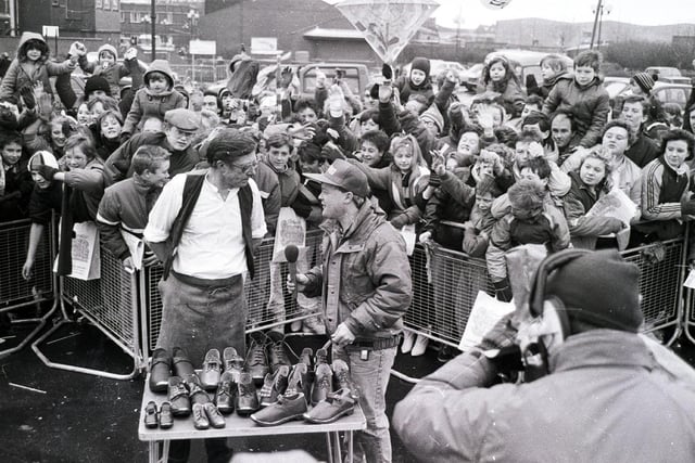 Retro 1987 - TV presenter Keith Chegwin "Cheggers" meets Walter Hurst Wigan's premier clogmaker at Wigan Pier  in 1987
