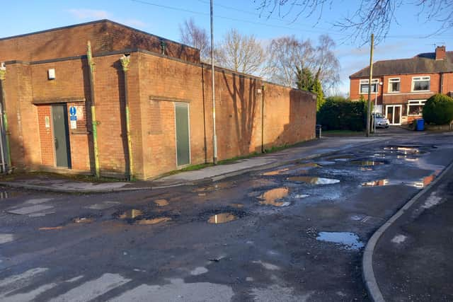 The cratered Quaker's Place, Standish, which is next to an electricity substation