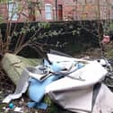 Coun George Davies highlighted fly-tipping in Spring Gardens, Wigan, earlier this year