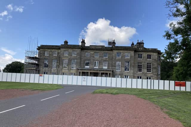 The stately home, once owned by the Earls of Crawford and Balcarres, is encased in scaffolding as the exterior restoration work continues.