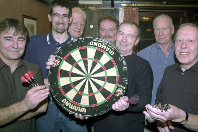 Darts Marathon men at The Hare and Hounds Pub Aspull near Wigan with Carl Gibbons ( second left) and some of the team ready to take on the towns best  to raise cash for Melanies Magic Wand Appeal, They are Stephen Melling ,Terry Moloney, Brian Culshaw , John Ryding , Jim Stapleton and Dave Smith.