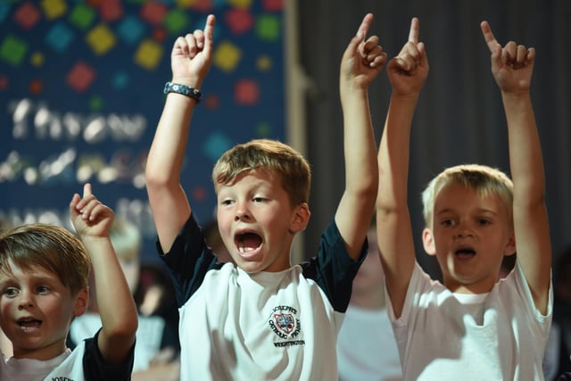 Pupils from the whole school perform at their Singing Extravaganza concert for parents.