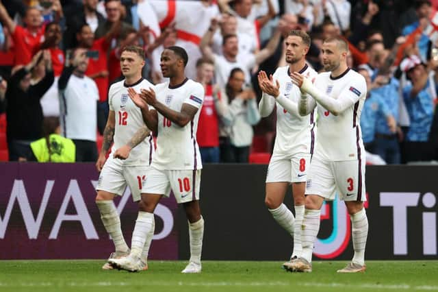 Kieran Trippier, Raheem Sterling, Jordan Henderson and Luke Shaw. (Photo by Catherine Ivill/Getty Images)