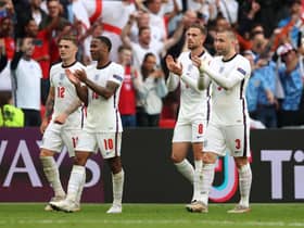Kieran Trippier, Raheem Sterling, Jordan Henderson and Luke Shaw. (Photo by Catherine Ivill/Getty Images)