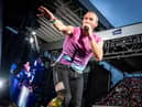 Coldplay performs at Parken Stadium in Copenhagen. Photo by Mads Claus Rasmussen / Ritzau Scanpix / AFP via Getty Images