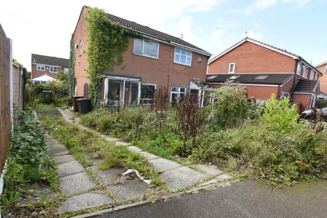 Wigan Today pictures show that the house remains an eyesore