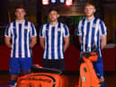 Charlie Hughes, Callum Lang and Liam Morrison model the new Latics kit