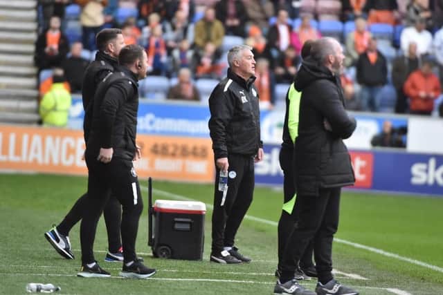 Rob Kelly oversees Latics' victory over Blackpool at the DW