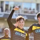 Luke Chambers (left) has returned to Liverpool for assessment