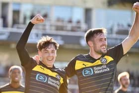 Luke Chambers (left) has returned to Liverpool for assessment