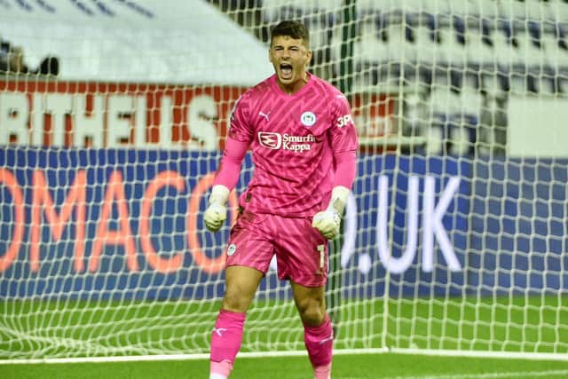 Sam Tickle is a happy man after Latics edged Fleetwood on penalties
