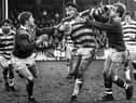 Wigan prop Brian Case battles through the St. Helens defence in the Good Friday league clash at Central Park on 1st of April 1983 which Wigan won 13-6.