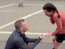 Niall West proposes to fiance Beth Miller during the Manchester Marathon on Sunday. The 28-year-olds from Bolton first met at Lancaster University and have been together for nine years.
