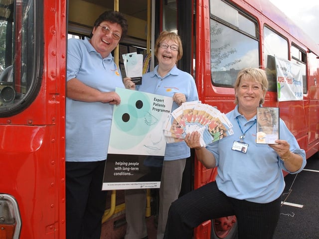 Ashton, Leigh and Wigan NHS Primary Care Trust's Big Red Bus pulled up at Boston House Wigan Health Centre, Frog Lane, for the start of its tour of the borough to promote the Expert Patients Programme. Handing out the informatiion were Carole Sawers, EPP co-ordinator, left, Margaret Hughes, volunteer tutor, and Anne Campbell, health information officer