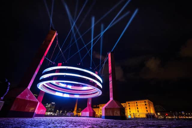 An artwork illuminates the night at a previous River Of Light event