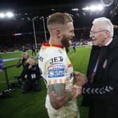 Wigan Warriors departing chairman Ian Lenagan with legend Sam Tomkins after the Grand Final
