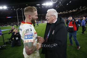 Wigan Warriors departing chairman Ian Lenagan with legend Sam Tomkins after the Grand Final