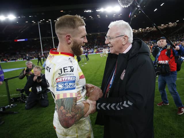 Wigan Warriors departing chairman Ian Lenagan with legend Sam Tomkins after the Grand Final