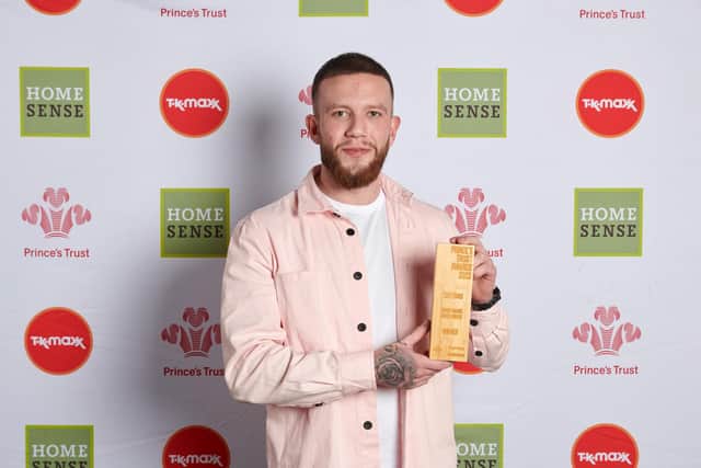Tom Evans with his Watches of Switzerland Group Young Change Maker Award