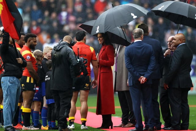 The Princess of Wales interacts with Rhyse Martin of Papua New Guinea