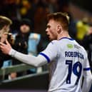 Luke Robinson celebrates with the away fans at Mansfield in midweek