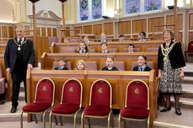 Mab's Cross Primary School pupils welcome to the Wigan town hall council chamber by Mayor Jenny Bullen and consort Andrew Bullen