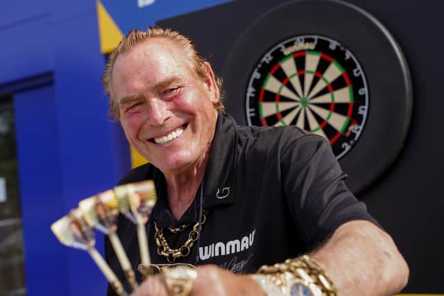 Bobby "Dazzler" George was at the launch and challenged staff and customers at darts.