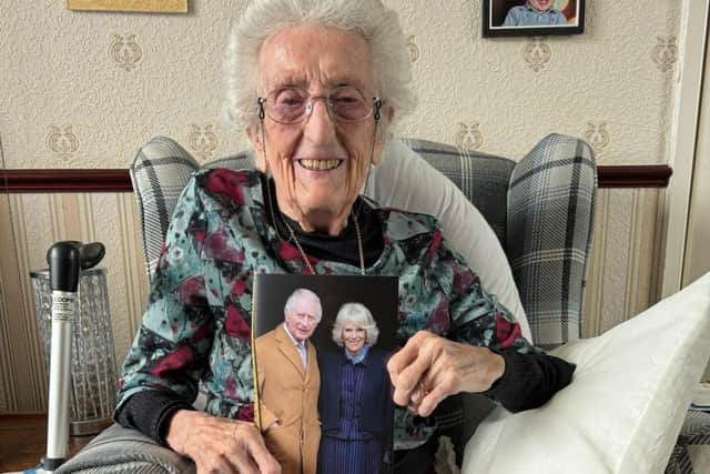 Margaret Pendlebury with her birthday card from the King