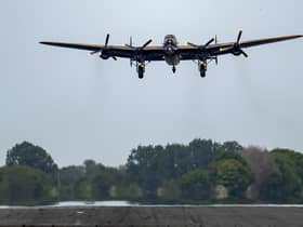 The City of Lincoln Lancaster Bomber takes to the sky for the memorial flight of the 80th anniversary of the WWII Dambusters Raid at RAF Coningsby