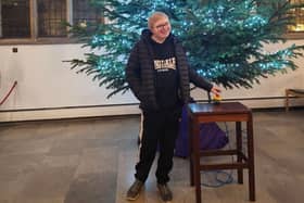 Darren Bandcroft switches on the Christmas lights