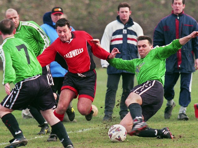Action from Winstanley St. Aidens v Pemberton Town in the Wigan Amateur League Premier Division match on Saturday 11th of March 2000. Winstanley St. Aidens won 2-0.